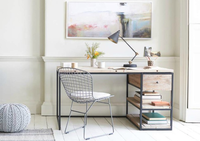 A stone desk in an office with a calm, relaxed style.
