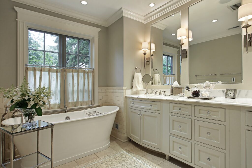 A white traditional bathroom made ready for guests to use.