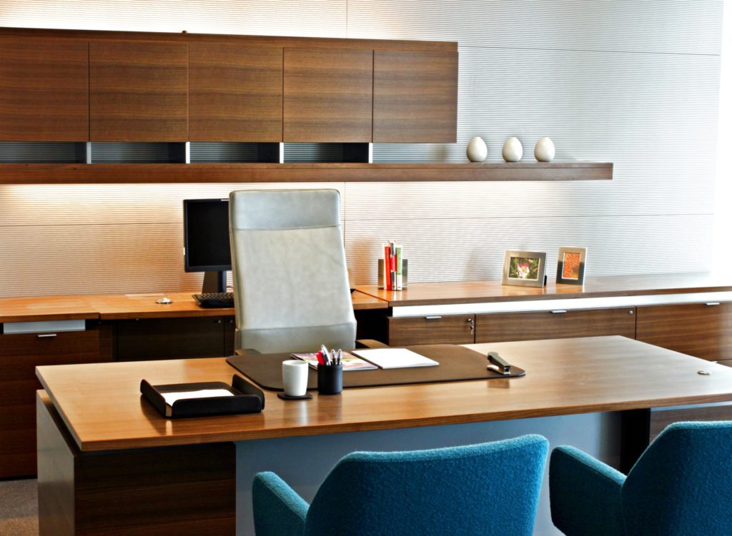 A luxury office with a stylish and comfortable desk chair.