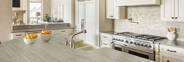 A traditional kitchen with light gray Dekton counters