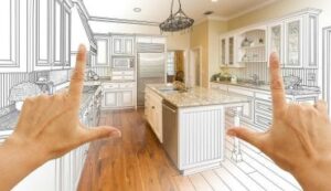 person holding up their hands in the shape of "L's" envisioning new kitchen layout