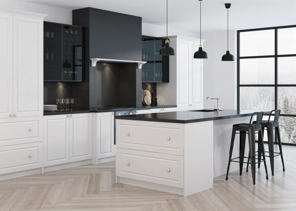 A kitchen in winter with stone counters and counter top heaters.